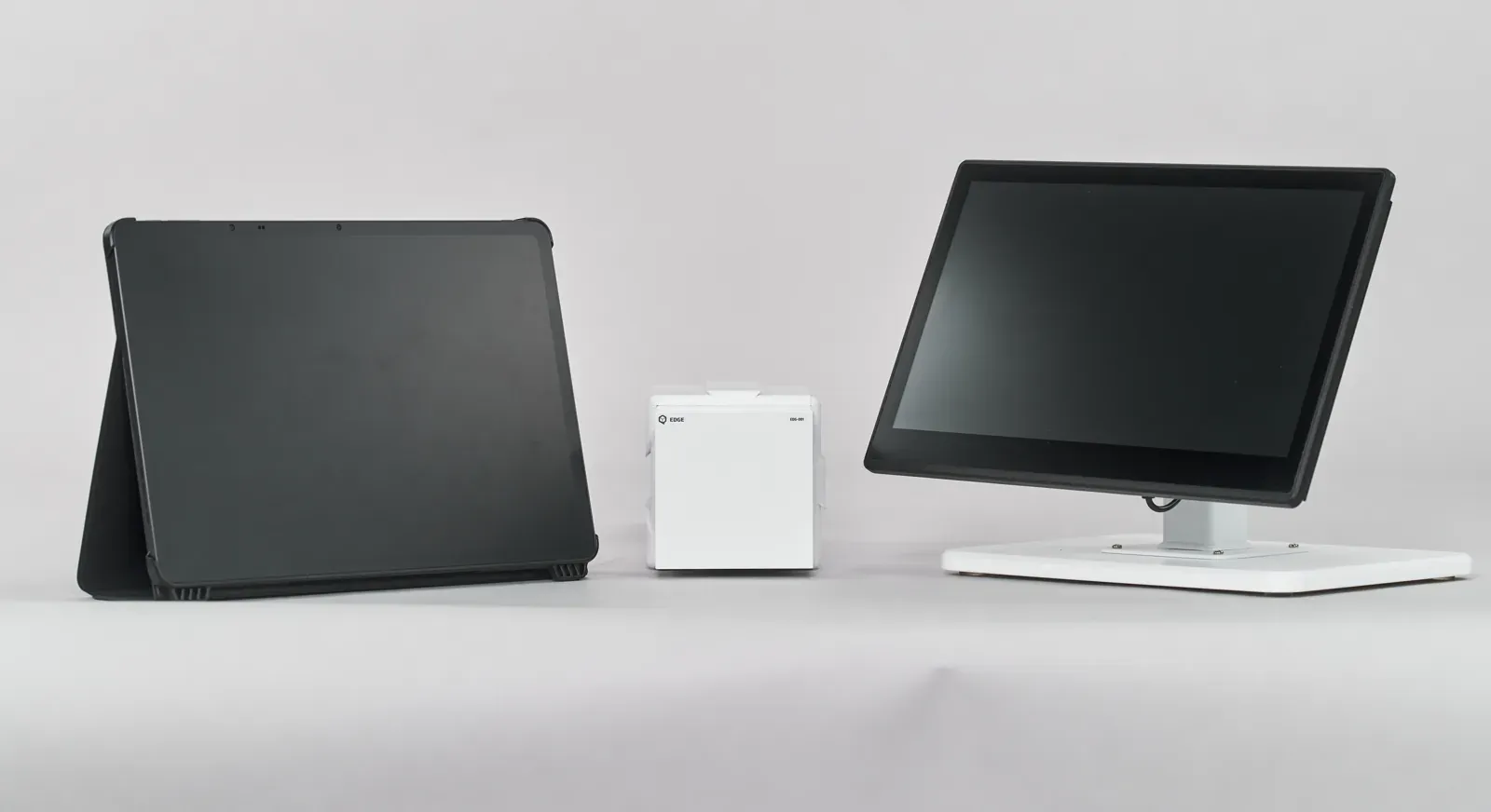 QB Edge with a tablet and a touchscreen monitor running QB Control
