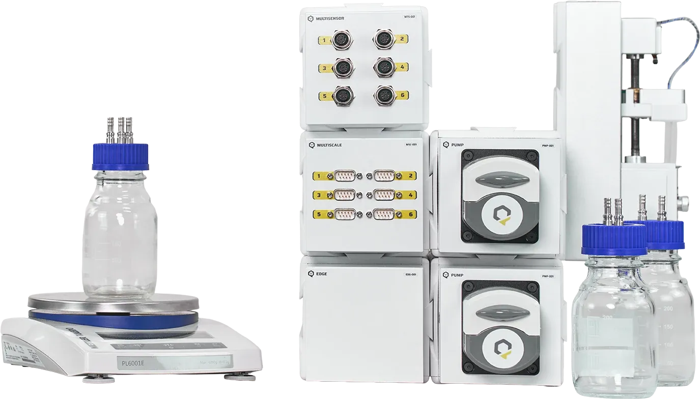 QB dosing setup with a balance, media bottles, pumps and the Multiscale module